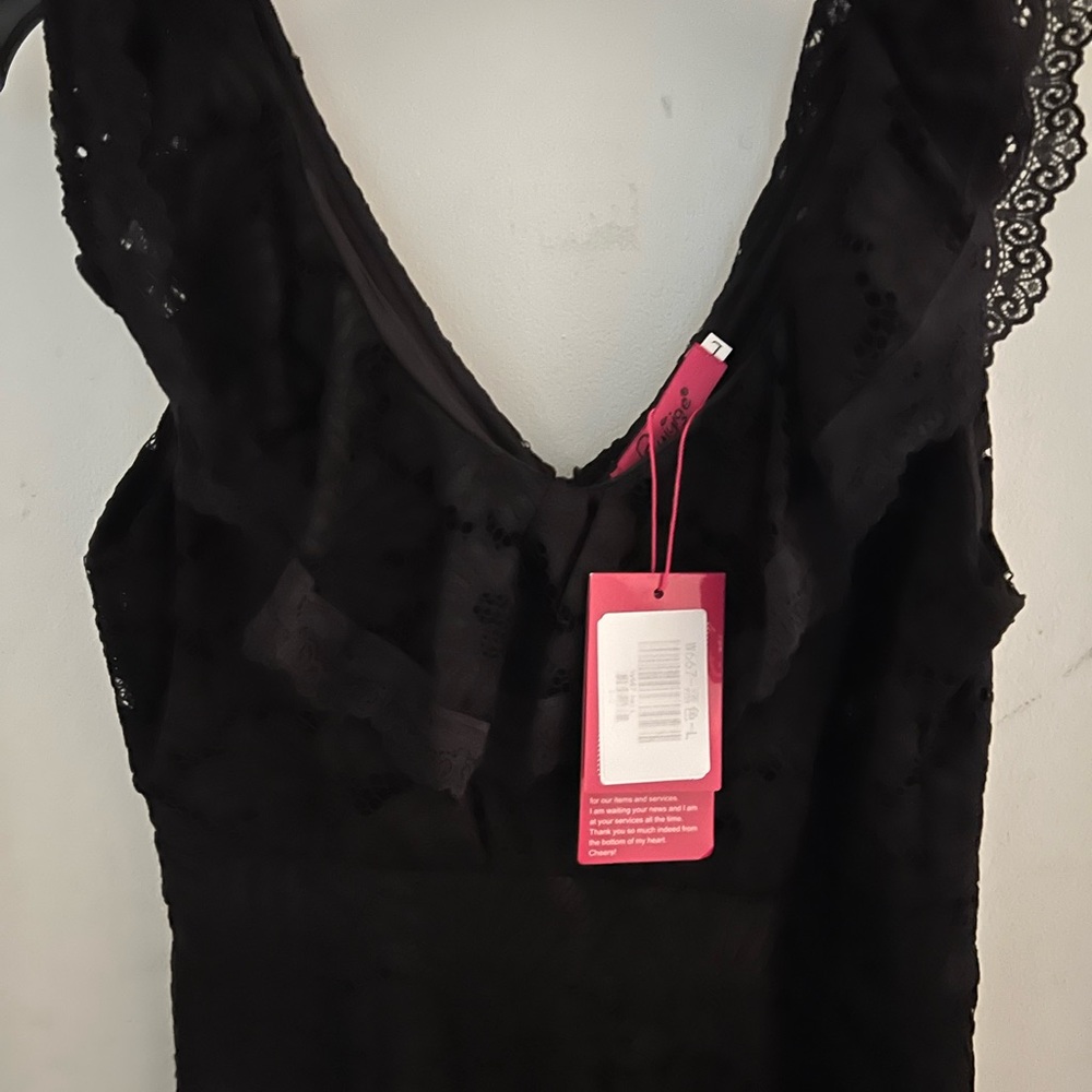 Black lace dress that fits like a glove size large